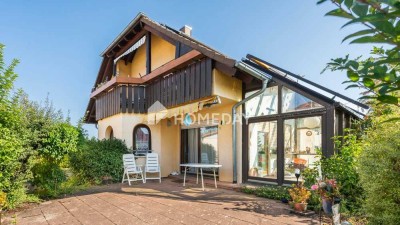 Mehrfamilienhaus mit 3 Wohneinheiten, Wintergarten, Garten, Terrasse, Doppelgarage und PV-Anlage