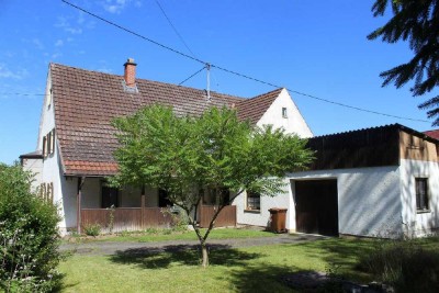 Handwerker aufgepasst! Haus mit viel Potential und Baugrundreserve im Grünen