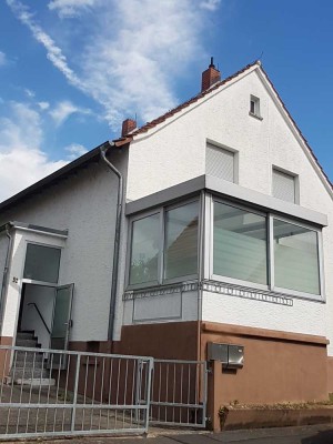 Einfamilienhaus mit Anbau, Garten und Garage in Niddatal/Ilbenstadt
