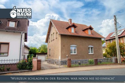 Familienfreundliches Einfamilienhaus mit idyllischem Garten am Wasser
