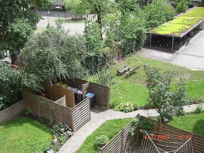 Charmante, ruhige 4-Zi-Wohnung mit EBK / Hochparterre mit Balkon und  zwei Garagen