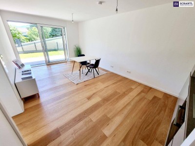 Neuer Preis! Die ideale Kleinwohnung mit Garten! Kleine Wohnung mit viel Freiraum! Traumhafter Eigengarten und Terrasse + Stylische Einbauküche + Grün wohin das Auge reicht + Luftwärmepumpe!