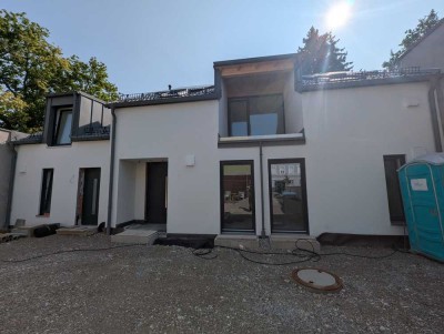 Neubau: 3-Zimmer-Erdgeschoss Wohnung mit Terrasse und Garten