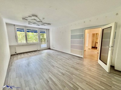 SCHULTZ IMMOBILIEN - Charmante 2-Zimmer-Wohnung in Baden! Ruhelage! Balkon und Garage!
