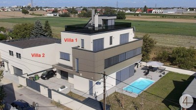 2 Premium-Villen direkt nebeneinander - mit grünem Weitblick - sonnige Ausrichtung - hochwertige Ausstattung - Salzwasserpool - Garage - Lift