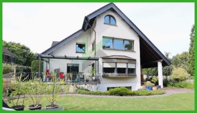 Menden – Platte Heide: 
Zweifamilienhaus mit viel Platz für Wohnen & Arbeiten!