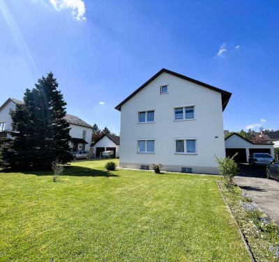 Platz für Ideen: Zweifamilienhaus mit Traumgrundstück in Hart an der Alz