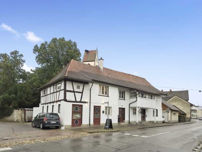 Denkmalgeschütztes Mehrfamilienhaus als Kapitalanlage – 4 Wohnungen und Gewerbe