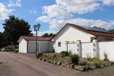 Attraktives Ein-/ Zweifamilienhaus mit PV- Anlage, Wallbox und Doppelgarage in bester Ortslage