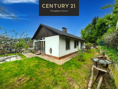 Sonnenlage! Freistehendes EFH mit Einliegerwohnung und Garten.
