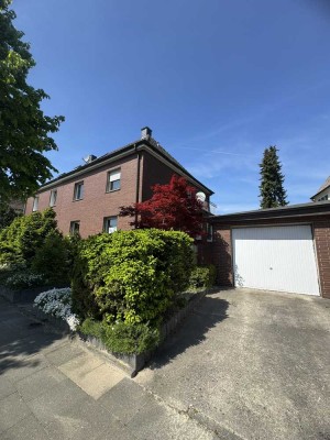 Attraktive Ein-/ Zweifamiliendoppelhaushälfte mit Garage auf großem Grundstück