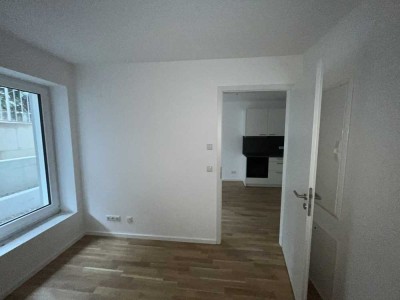 Neubau 2-Zimmer Souterrain Wohnung mit moderner Küche in der Ludwigsvorstadt