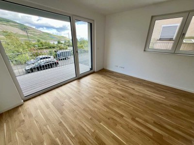 Erstbezug: Moderne 2-Zimmer-Neubauwohnung mit Balkon und Rheintalblick