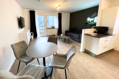 Möbliertes Wohnen - 2 Zi mit Balkon voll ausgestattet unweit vom Hofgarten mit Stellplatz