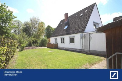 Drei Wohnungen und große Lagerhalle mit schönem Garten und Garage!