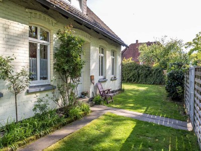 Ein Zuhause, das Sie willkommen heißt – Erdgeschosswohnung voller Charme in Sandkrug.