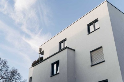 Komfortables 3,5-Zimmer-Penthouse mit riesiger Dachterrasse, toller Einbauküche und Tiefgarage