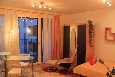 1-Zimmer-Wohnung mit Balkon und Tiefgarage. Toplage, starke Rendite