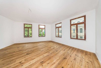 Mit Süd-Balkon & 2 Bädern: Große 5-Zimmer-Kapitalanlage in schönem Gründerzeitbau