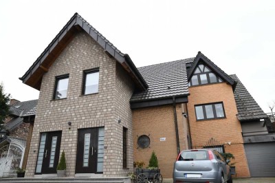 Hochwertige Wohnung mit eigenem Garten