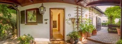 Ihr Rückzugsort im Grünen – gemütlicher Bungalow mit Kachelofen, Sauna, herrlichem Garten und Garage