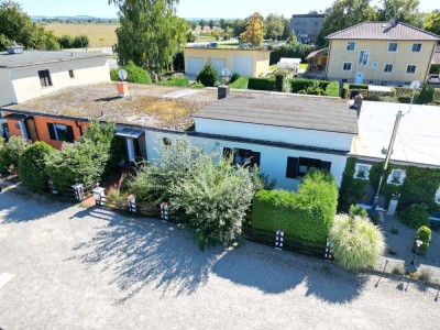 Wohnen auf einer Ebene: Bungalow mit Garten