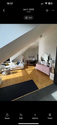 Möblierte Dachgeschosswohnung mit Traumblick über München – Befristete Vermietung auf Zeit