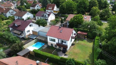 Einfamilienhaus mit großzügigem Garten, Schwimmbad und viel Potenzial!