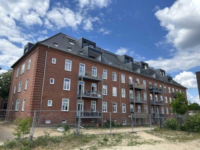 Erstbezug! Mit Holzdielen, Stellplatz, Fahrstuhl, barrierearm, u.v.m.