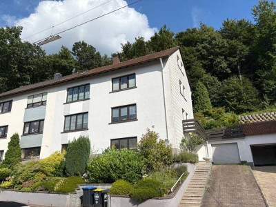 Eigentumswohnung mit Wintergarten, Garage und Gartenmitbenutzung in zentraler Lage von Püttlingen