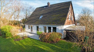 Großzügiges Einfamilienhaus auf Süd-West Grundstück mit Garage und Carport