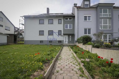 Charmante 4-Zimmerwohnung im Erdgeschoss mit Terrasse und Gartenanteil
