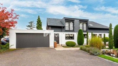 EFH bzw. ZFH in ruhiger Lage von Pirmasens-Erlenbrunn mit modernisierten Details und schönem Garten