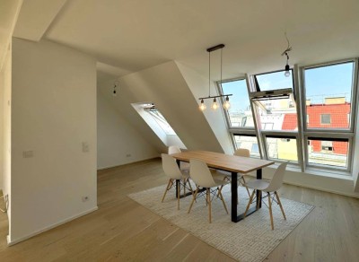 Erstbezugs-DG-Wohnung mit Terrasse und Weitblick!
