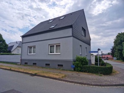 Einfamilienhaus mit Garage und Nebengelass in Langenweddingen