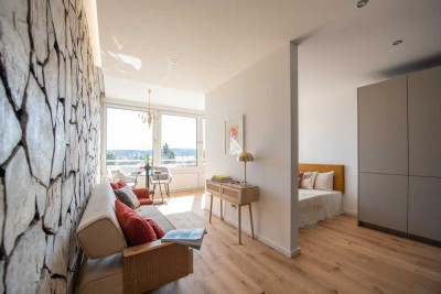 Erstbezug - Exklusive 1-Zimmer-Wohnung mit Seeblick