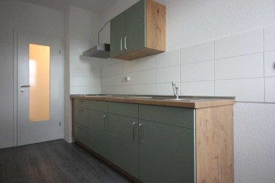 1-Raum-Wohnung mit Küchenmöbel