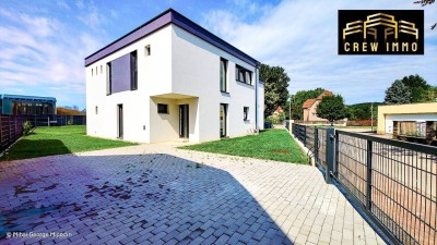 Moderne Doppelhaushälfte in Wimpassing: Erstbezug mit Garten, Terrasse und viel Platz!