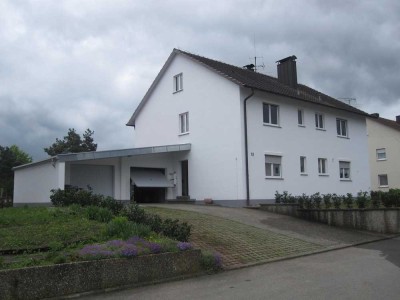 Wohnung im 1. OG mit großem Garten, Balkon und Kaminofen