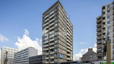 Helle 2-Zimmer-Wohnung im 13. Stock mit Wintergarten und Weitblick