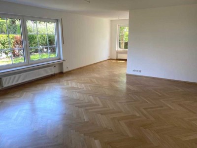 Großzügige Dreizimmerwohnung mit Garten und Kamin