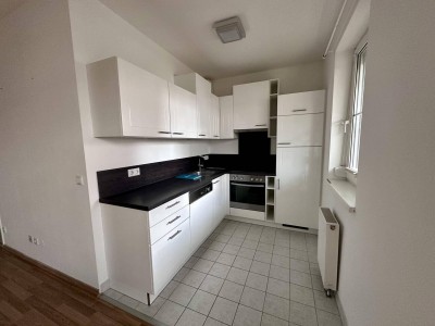Starterwohnung im Zentrum mit Garten und Tiefgaragenstellplatz!