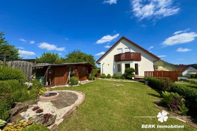 BERK Immobilien – Gepflegtes Einfamilienhaus 
mit Gartenidylle für die ganze Familie