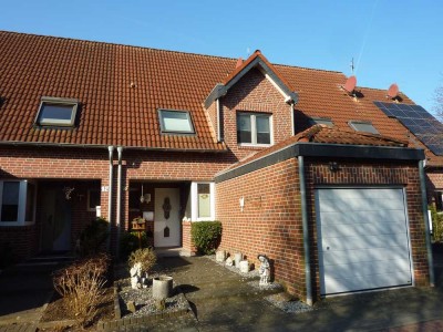 Zentral und dennoch ruhig gelegenes Reihenmittelhaus mit Wintergarten und Garage in Brüggen