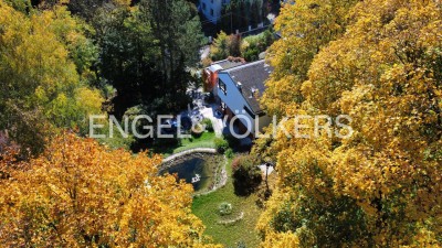 Südhang-Architektenhaus mit Naturgarten, Wellness – und einem zweiten Baugrundstück als Investitionsbonus