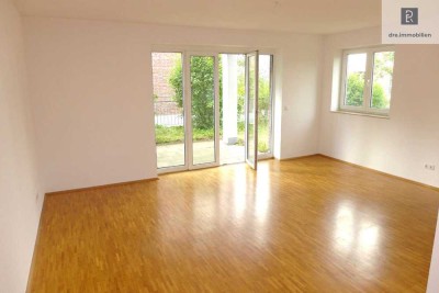 Köln-Dellbrück:  Charmante Zweizimmerwohnung mit Terrasse, Garten und Tiefgaragenstellplatz