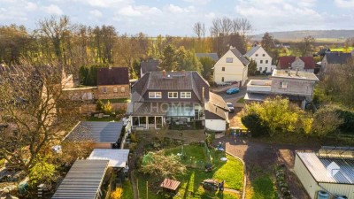 Idyllisches EFH mit Einliegerwohnung, großem Grundstück, Terrasse und 4 Garagen in Milzau