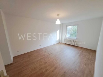 Helle Erdgeschoss-Wohnung mit Loggia und modernen Details