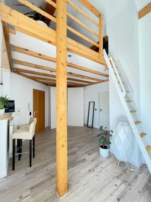 Außergewöhnliche 2-Zimmer-Dachgeschosswohnung mit TG inkl. Wallbox in Seenähe