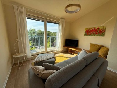 Möblierte, lichtdurchflutete 2-Zi. Dachgeschosswohnung mit 2 Terrassen, Lift & Tiefgarage